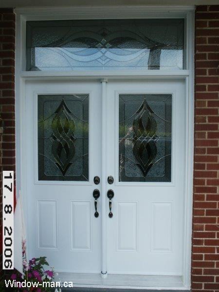 Double front doors installation. Entry steel insulated white. Half glass. Classic stained glass collection. Matching transom. Professionally installed